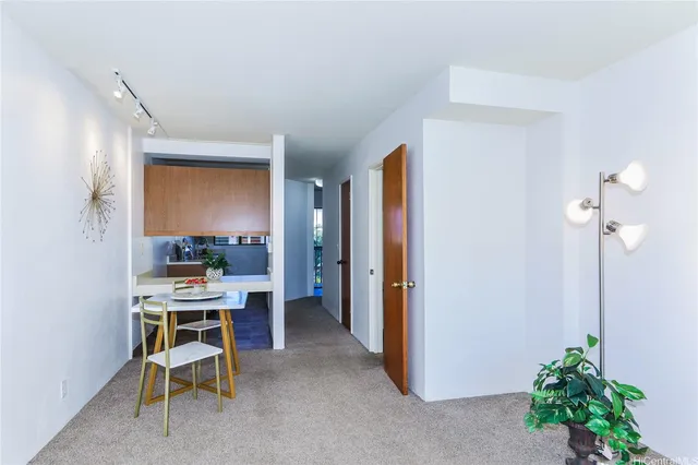 a view of a workspace with furniture