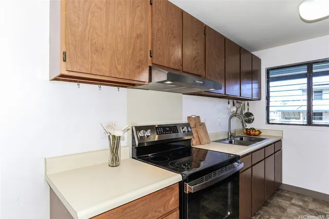 a kitchen with a stove and a microwave