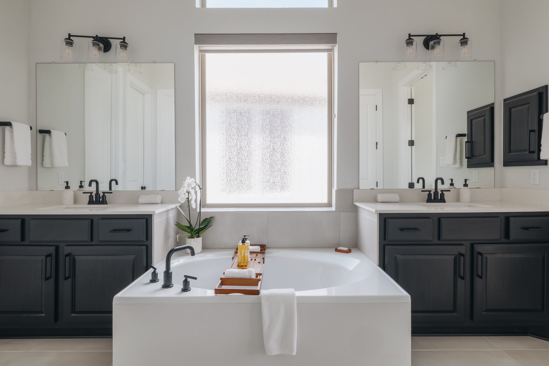 317 Autumn Oak Way Georgetown, TX 78628 - Photo 19 of 40 a bathroom with a sink and a mirror