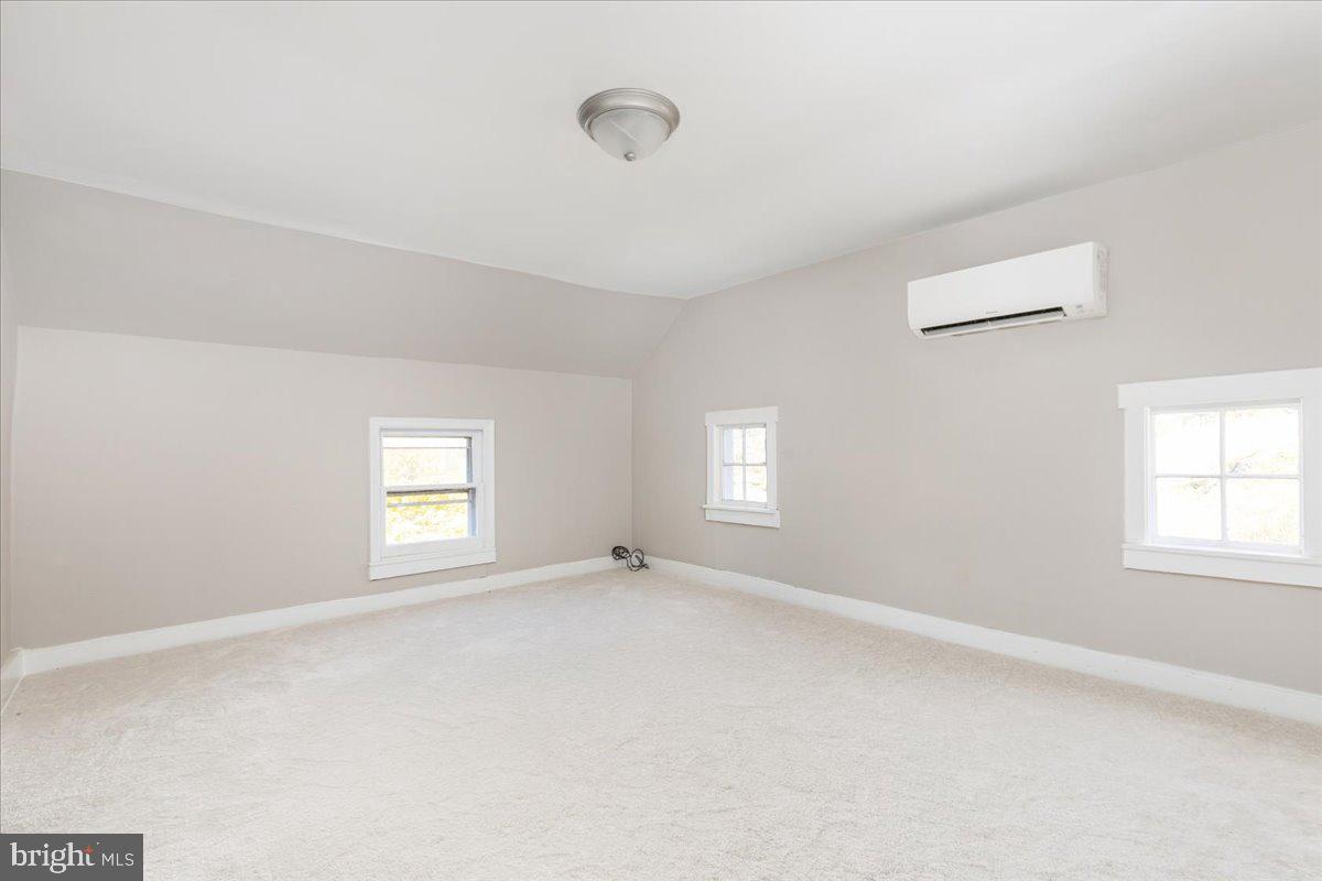 13886 Crest Hill Road Flint Hill, VA 22627 - Photo 16 of 45 an empty room with windows