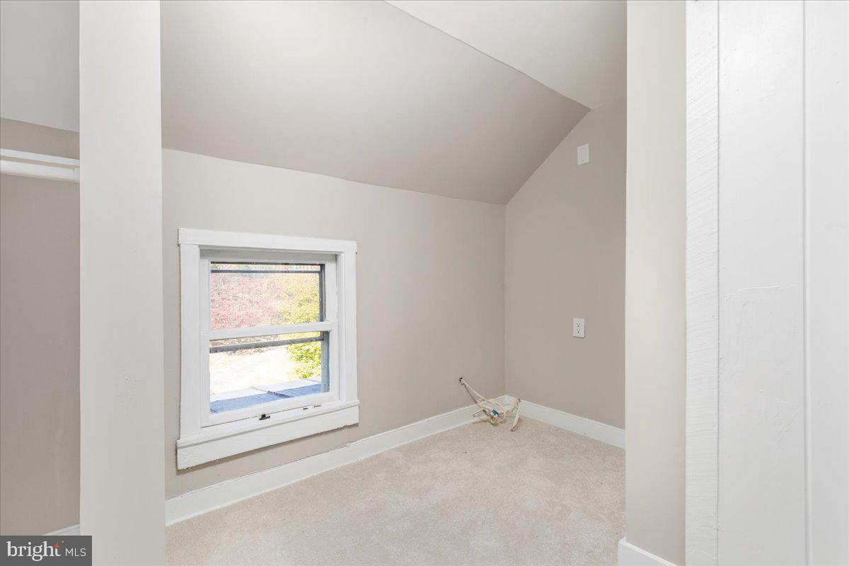 13886 Crest Hill Road Flint Hill, VA 22627 - Photo 20 of 45 a view of an empty room and a window