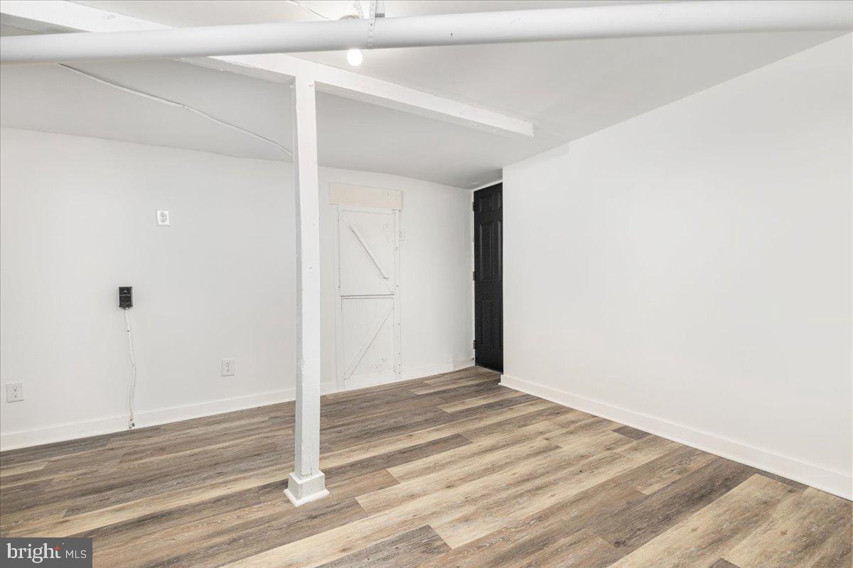 13886 Crest Hill Road Flint Hill, VA 22627 - Photo 21 of 45 a view of a room with wooden floor