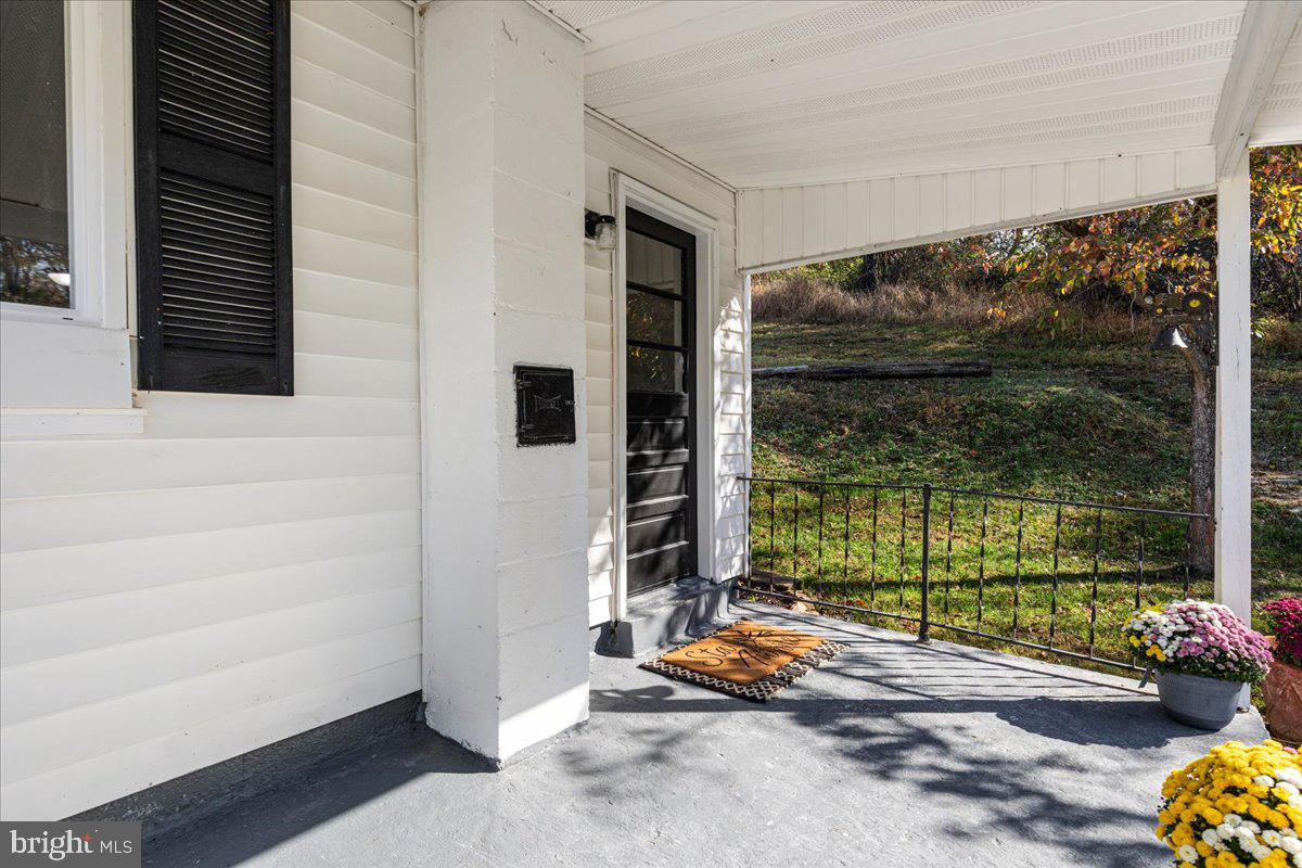 13886 Crest Hill Road Flint Hill, VA 22627 - Photo 24 of 45 a backyard of a house with seating space
