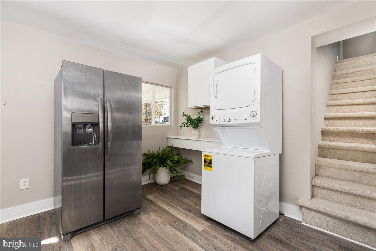 13886 Crest Hill Road Flint Hill, VA 22627 - Photo 8 of 45 a kitchen with stainless steel appliances a refrigerator and a stove