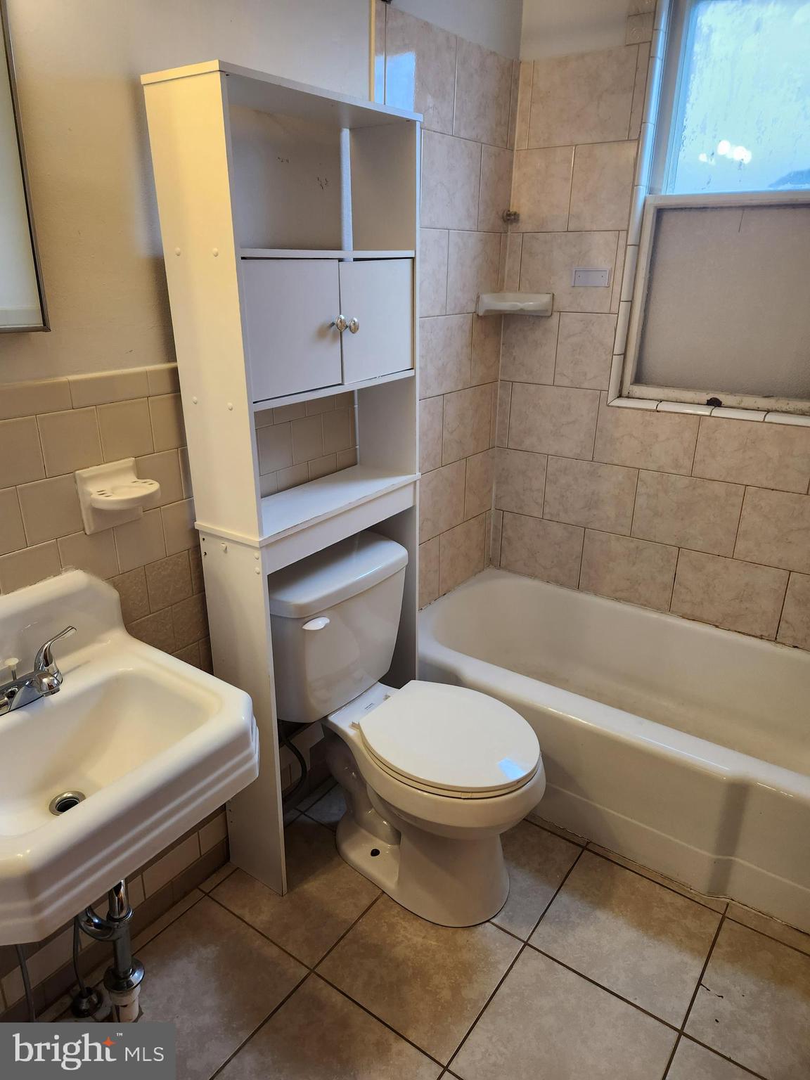 59 Gilmore Street Keyser, WV 26726 - Photo 12 of 13 a bathroom with a sink toilet and bathtub