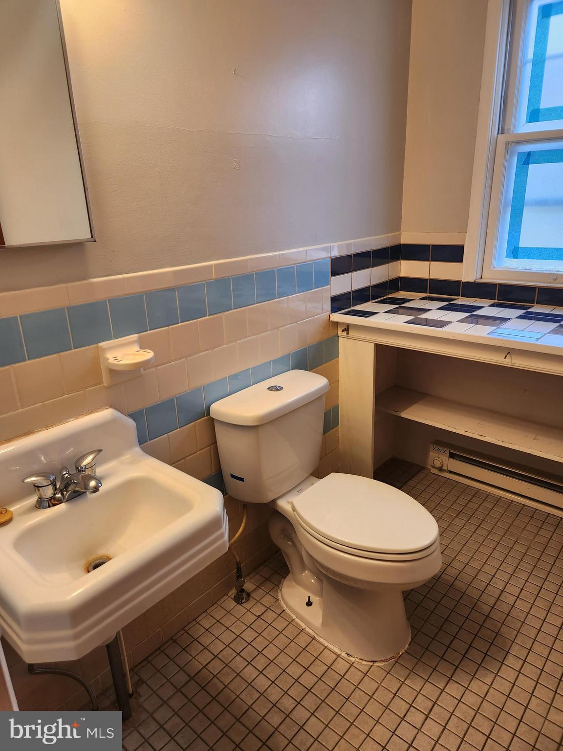 59 Gilmore Street Keyser, WV 26726 - Photo 13 of 13 a bathroom with a toilet and a sink