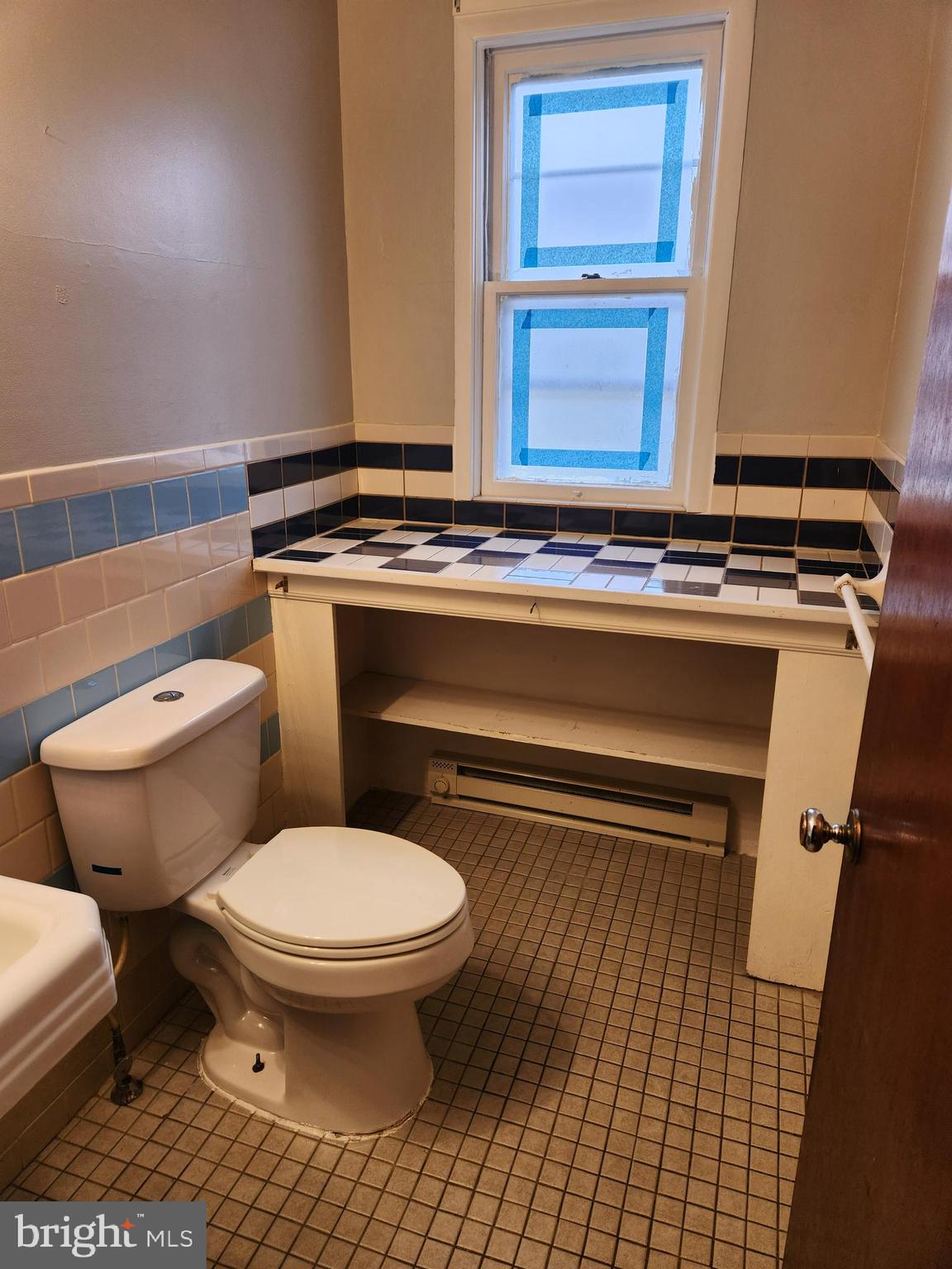 59 Gilmore Street Keyser, WV 26726 - Photo 7 of 13 a bathroom with a toilet and a shower