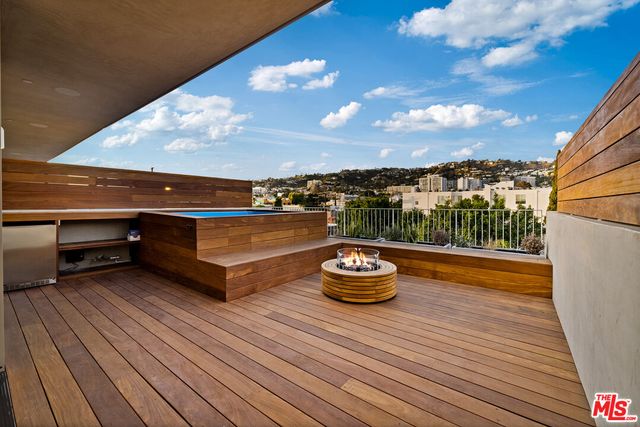a room with furniture and a large window