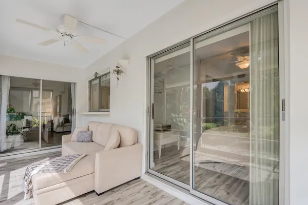 a view of a lake with houses in the back