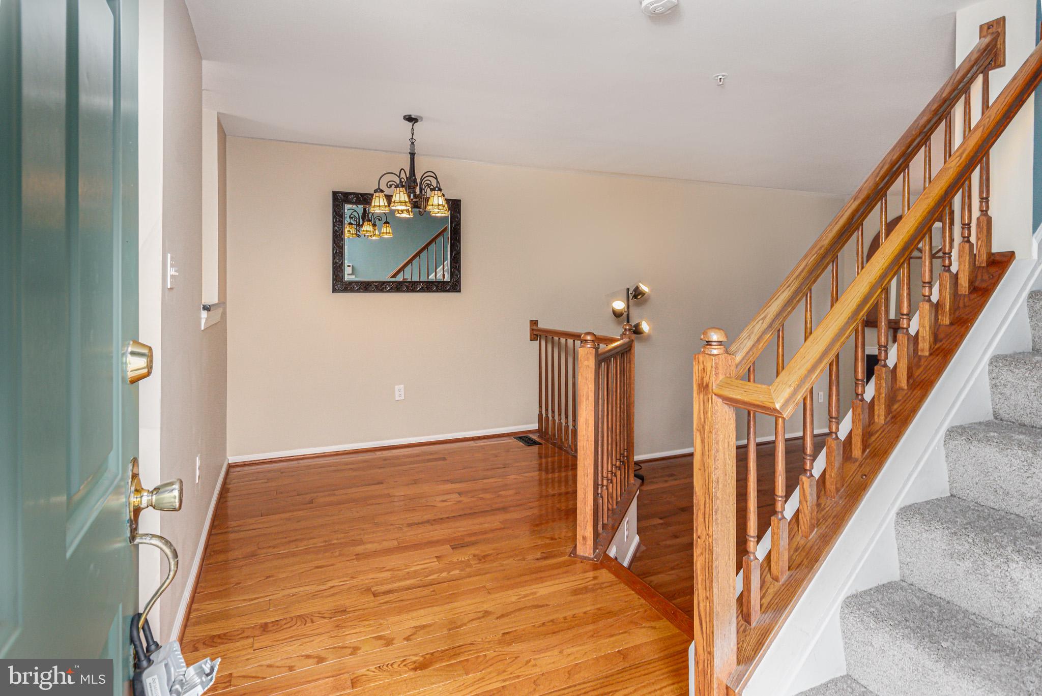 210 Sycamore Ridge Road Laurel, MD 20724 - Photo 5 of 40 Gleaming hardwoods greet you as you enter