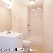 10437 Rutgers Road Jacksonville, FL 32218 - Photo 1 of 11 a bathroom with a sink a toilet and shower