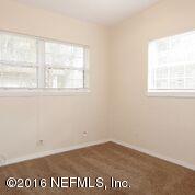 10437 Rutgers Road Jacksonville, FL 32218 - Photo 5 of 11 an view of an empty room with a window