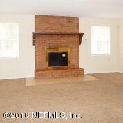 10437 Rutgers Road Jacksonville, FL 32218 - Photo 10 of 11 a view of a livingroom with a fireplace