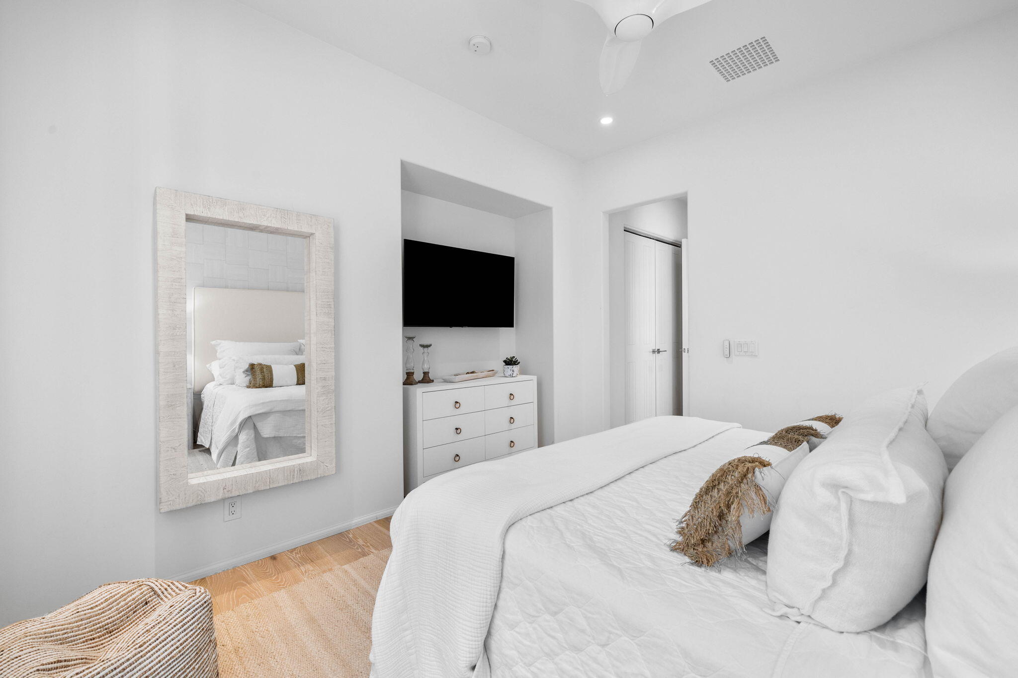 161 Catnap Alley Inlet Beach, Unit M6 Inlet Beach, FL 32461 - Photo 32 of 88 a bedroom with a bed and a flat screen tv