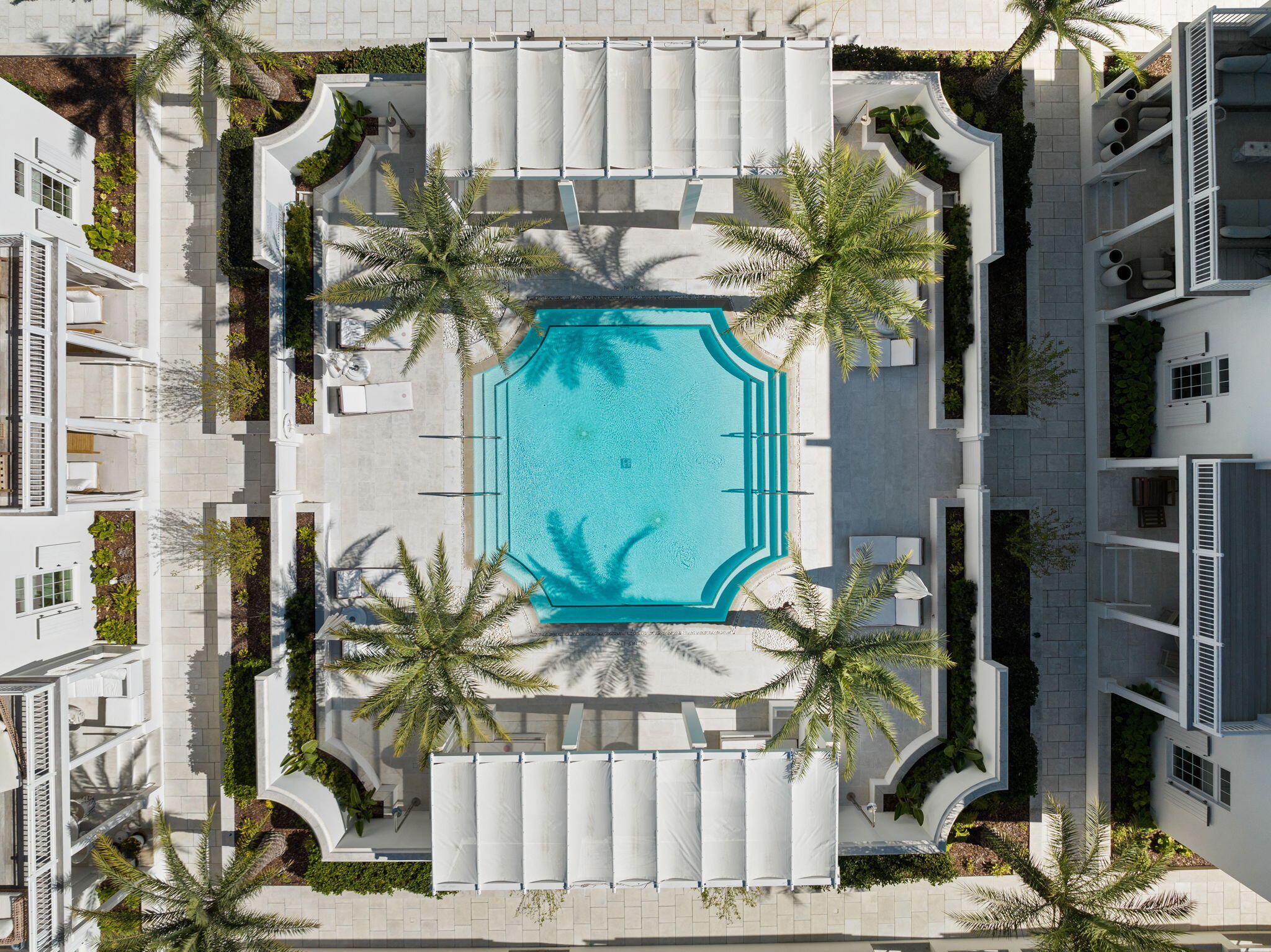 161 Catnap Alley Inlet Beach, Unit M6 Inlet Beach, FL 32461 - Photo 48 of 88 a vase of flowers sitting on a table in front of a building