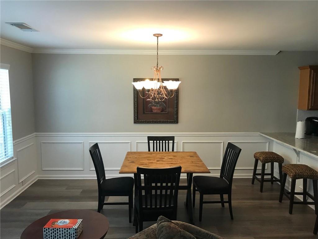 322 Hidden Creek Lane Canton, GA 30114 - Photo 12 of 44 a view of a dining room with furniture window and outside view