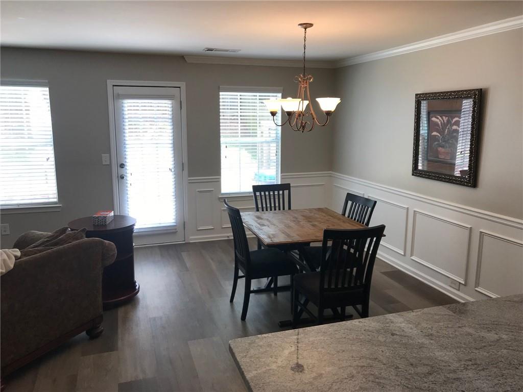322 Hidden Creek Lane Canton, GA 30114 - Photo 13 of 44 a view of a dining room with furniture