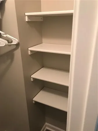 a storage room with washer and dryer