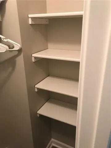 a storage room with washer and dryer