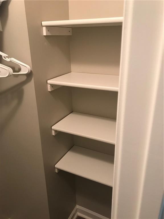 322 Hidden Creek Lane Canton, GA 30114 - Photo 34 of 44 a storage room with washer and dryer