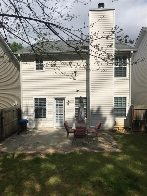 322 Hidden Creek Lane Canton, GA 30114 - Photo 38 of 44 a front view of a house with a yard