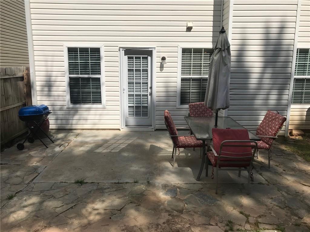 322 Hidden Creek Lane Canton, GA 30114 - Photo 39 of 44 a view of a two chairs in back of the house