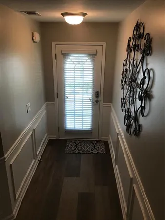 a view of a entryway door with a window