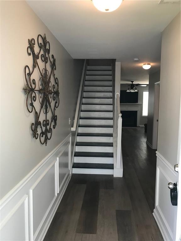 322 Hidden Creek Lane Canton, GA 30114 - Photo 5 of 44 a view of entryway and hall with wooden floor