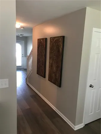 a view of a hallway with entryway