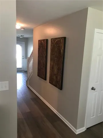 a view of a hallway with entryway