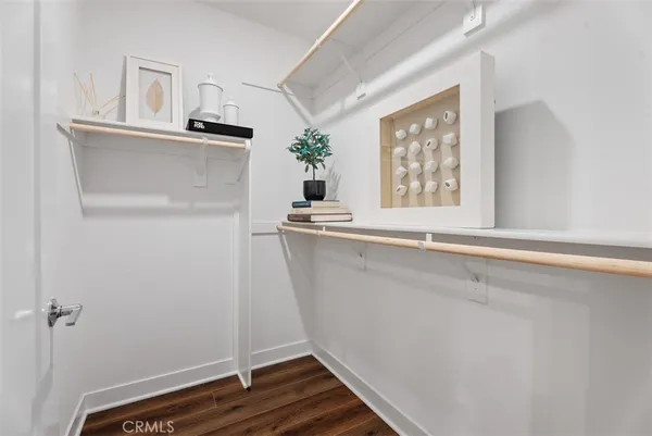 a bathroom with a double vanity sink and mirror