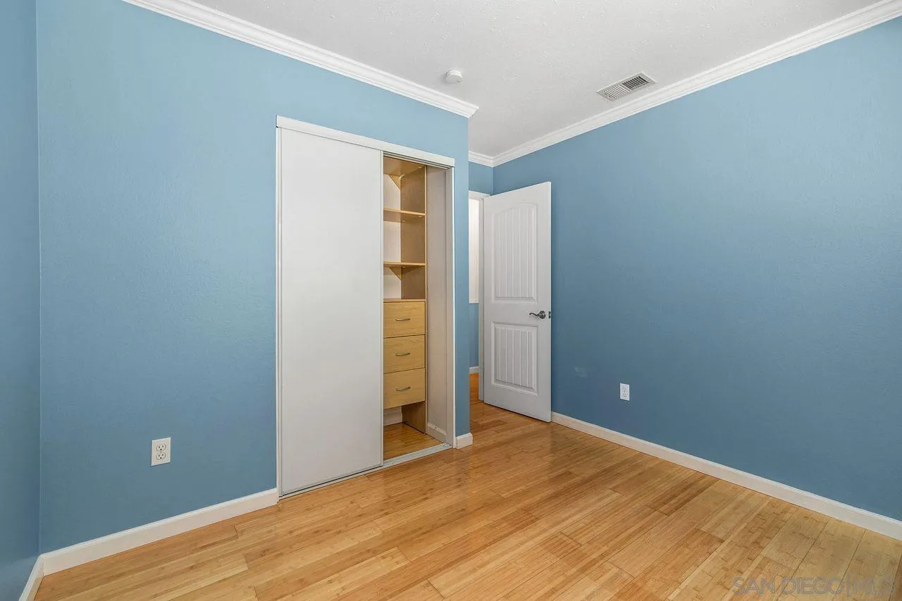 14215 Sutter Mill Way Poway, CA 92064 - Photo 36 of 38 an empty room with closet and bathroom