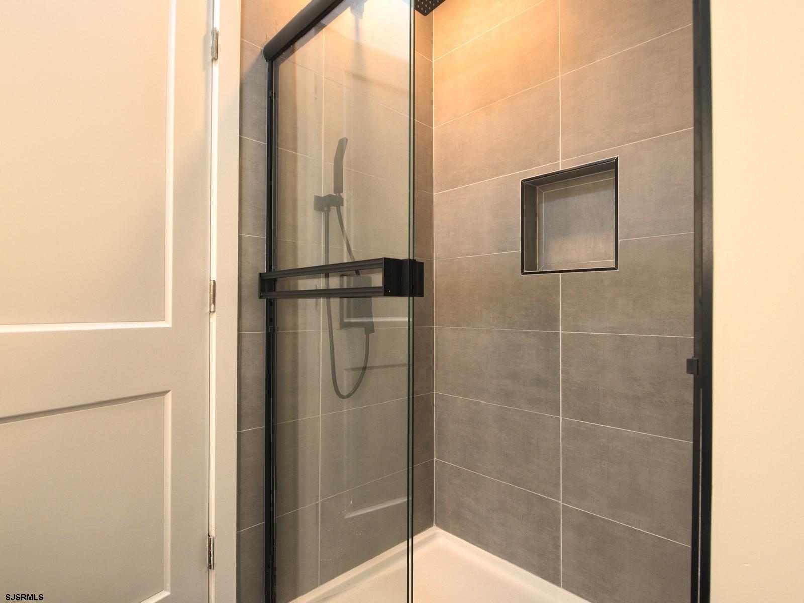 706 Augustine Road Atlantic City, NJ 08401 - Photo 29 of 56 a bathroom with a shower