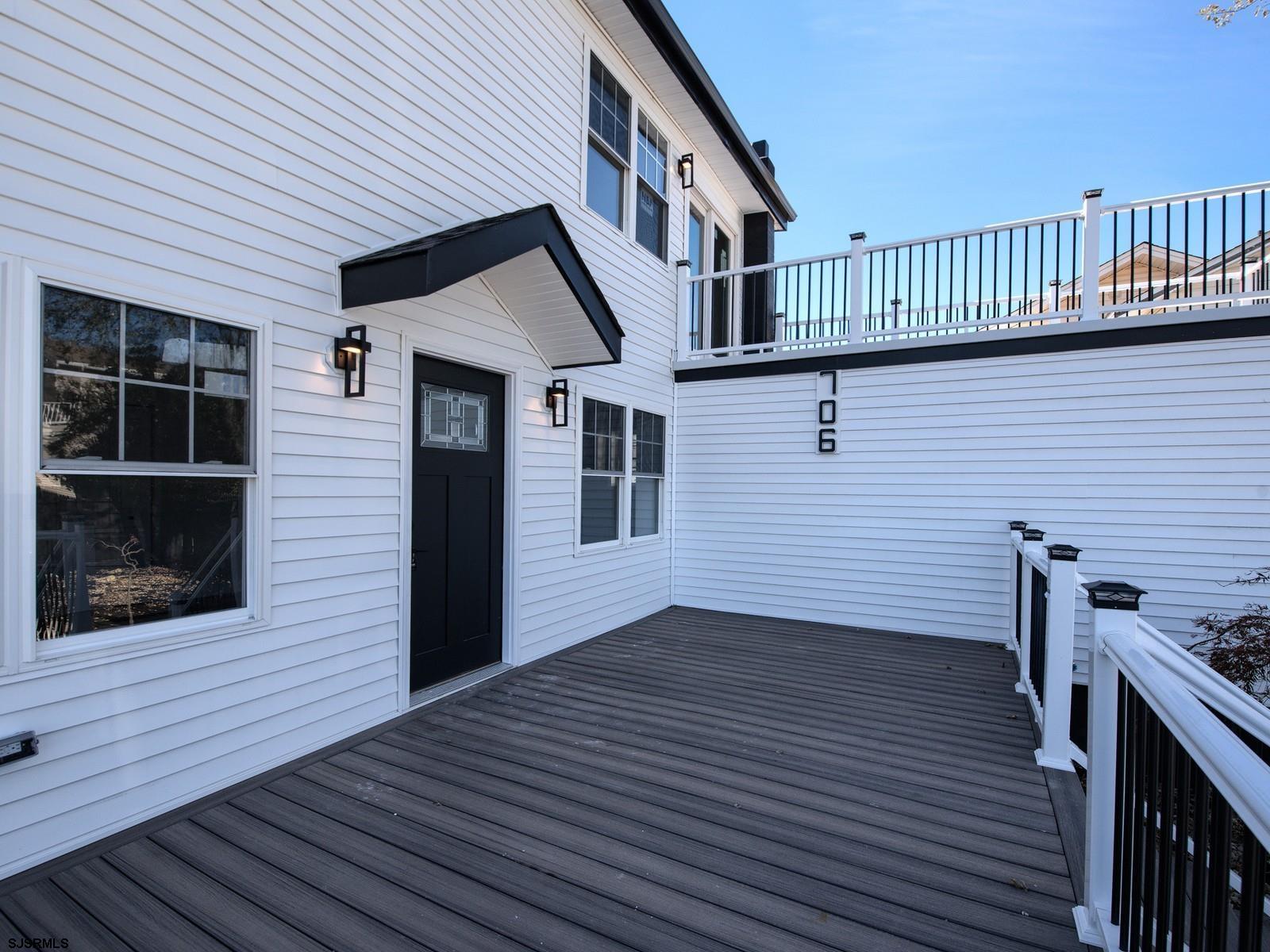 706 Augustine Road Atlantic City, NJ 08401 - Photo 6 of 56 a view of a house with wooden deck