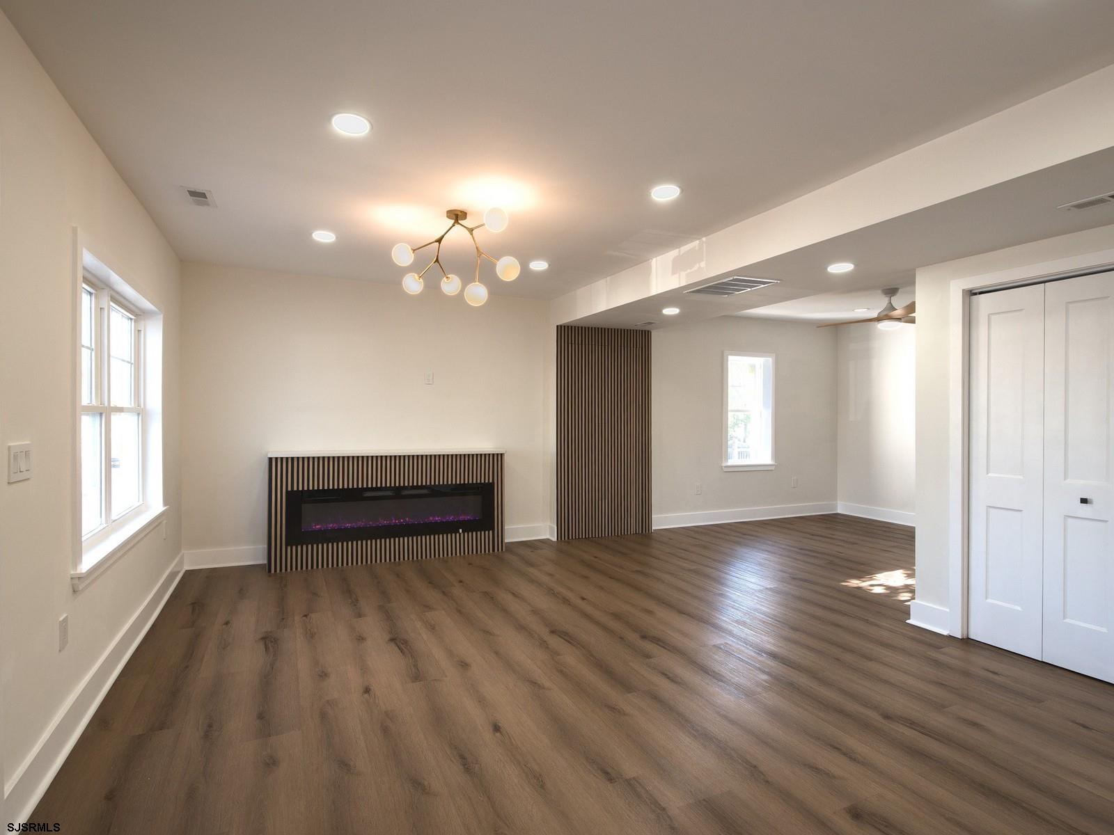 706 Augustine Road Atlantic City, NJ 08401 - Photo 9 of 56 a view of a room with wooden floor and window