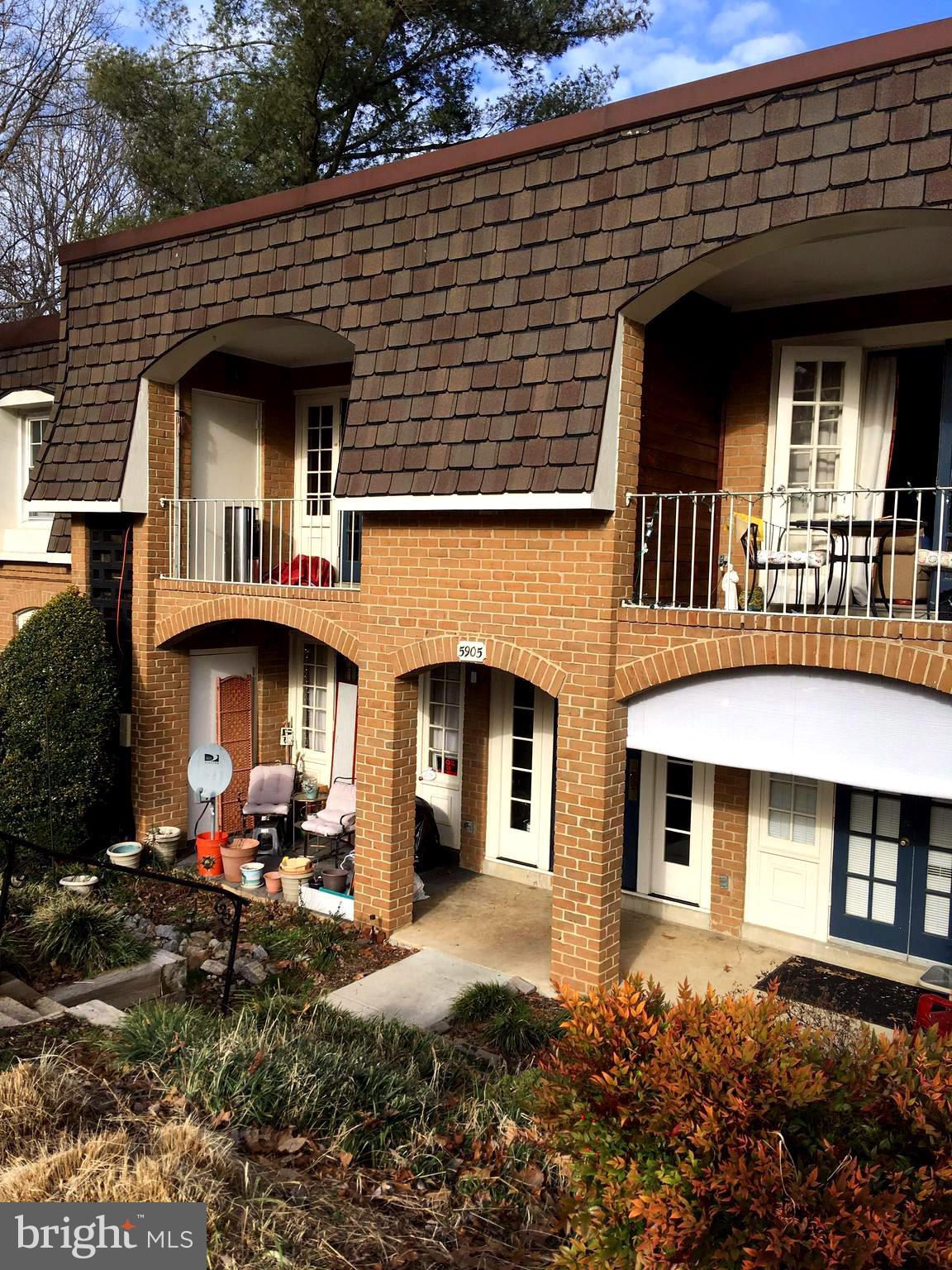 5905 Bayshire Road, Unit 182 Springfield, VA 22152 - Photo 2 of 27 Well kept landscaping brightens life at C.F!