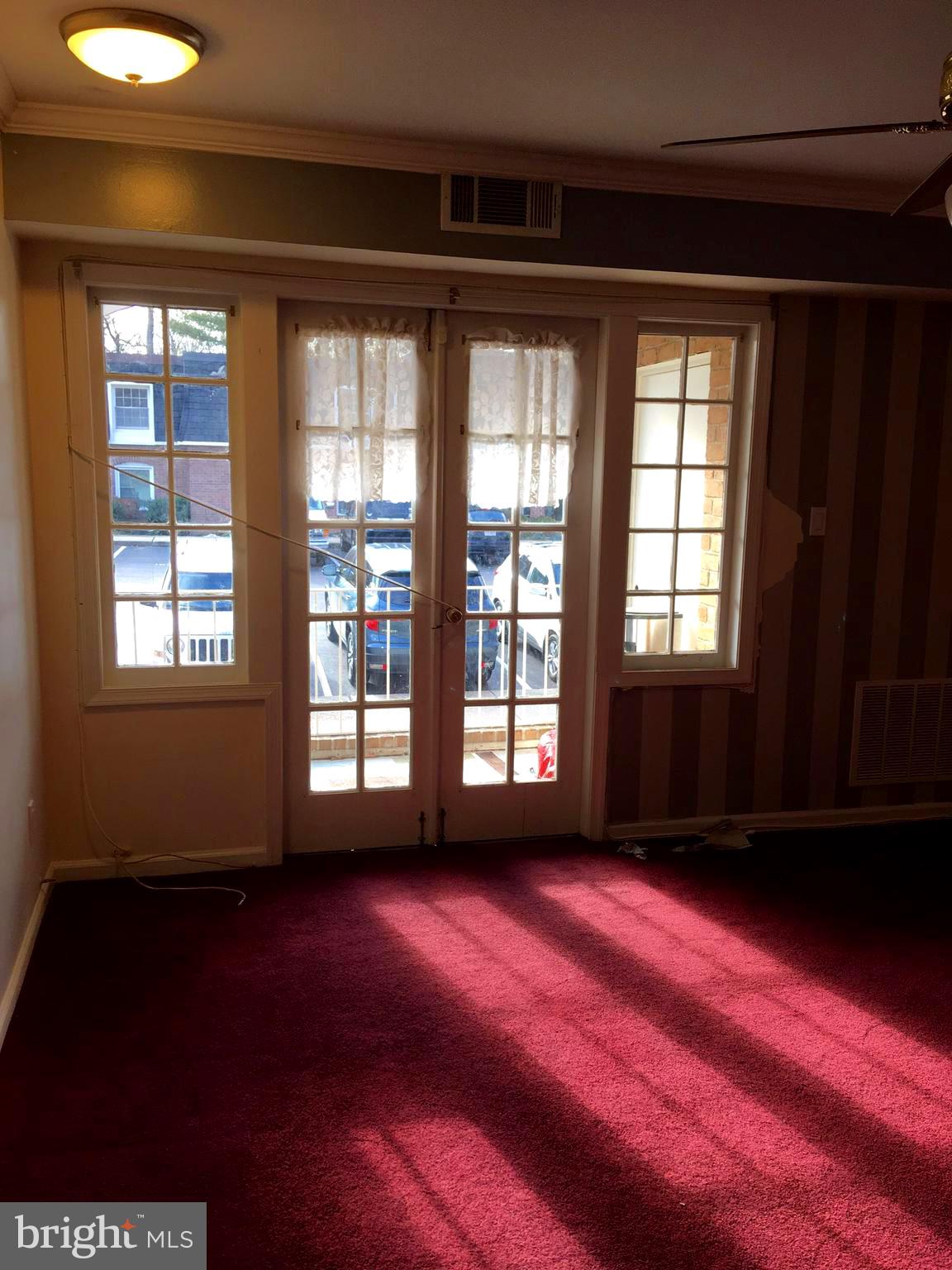 5905 Bayshire Road, Unit 182 Springfield, VA 22152 - Photo 11 of 27 Dining-living area affords French doors to balcony