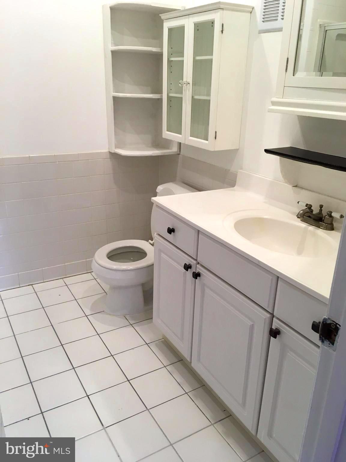 5905 Bayshire Road, Unit 182 Springfield, VA 22152 - Photo 20 of 27 Master Bathroom appears through walking closet.