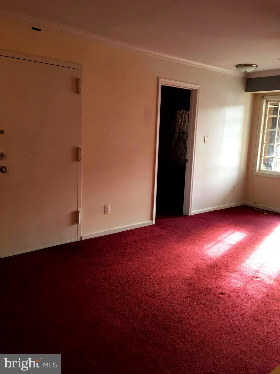 5905 Bayshire Road, Unit 182 Springfield, VA 22152 - Photo 8 of 27 Dining-living room leads to 3rd bedroom