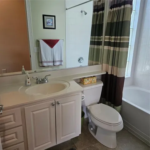 a utility room with cabinets