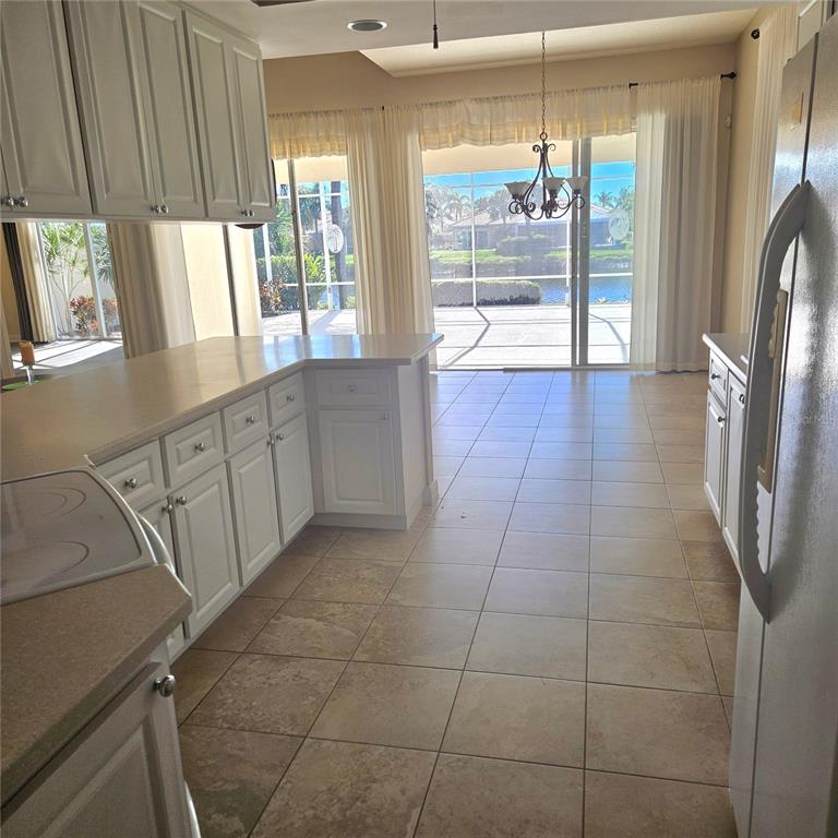 13415 Coluccio Street Venice, FL 34293 - Photo 9 of 39 a view of an empty room and window