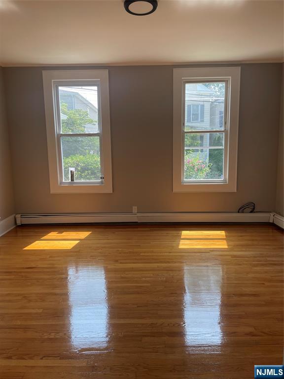 508 2nd Street, Unit 1 Carlstadt, NJ 07072 - Photo 2 of 41 a view of empty room with window and wooden floor