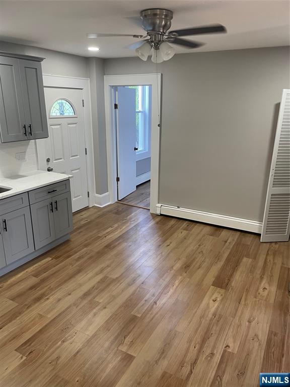 508 2nd Street, Unit 1 Carlstadt, NJ 07072 - Photo 22 of 41 wooden floor in an empty room with a mirror