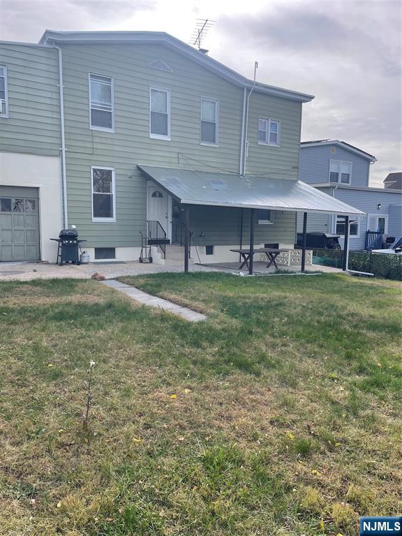 508 2nd Street, Unit 1 Carlstadt, NJ 07072 - Photo 39 of 41 a view of a house with a yard and sitting area