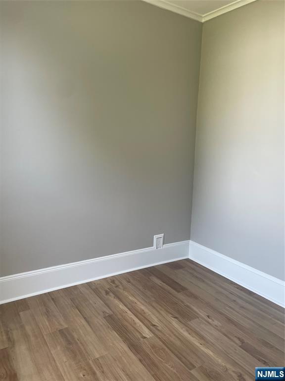508 2nd Street, Unit 1 Carlstadt, NJ 07072 - Photo 6 of 41 a view of an empty room with wooden floor