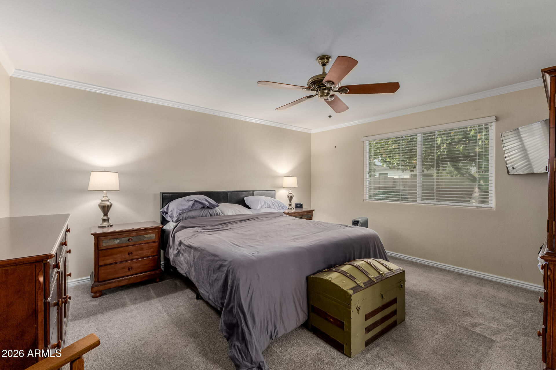 802 West Caribbean Lane Phoenix, AZ 85023 - Photo 25 of 47 a bedroom with a bed mirror and window