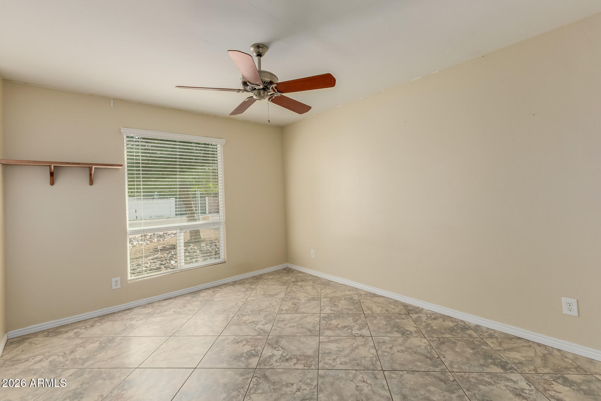 802 West Caribbean Lane Phoenix, AZ 85023 - Photo 29 of 47 an empty room with windows and fan