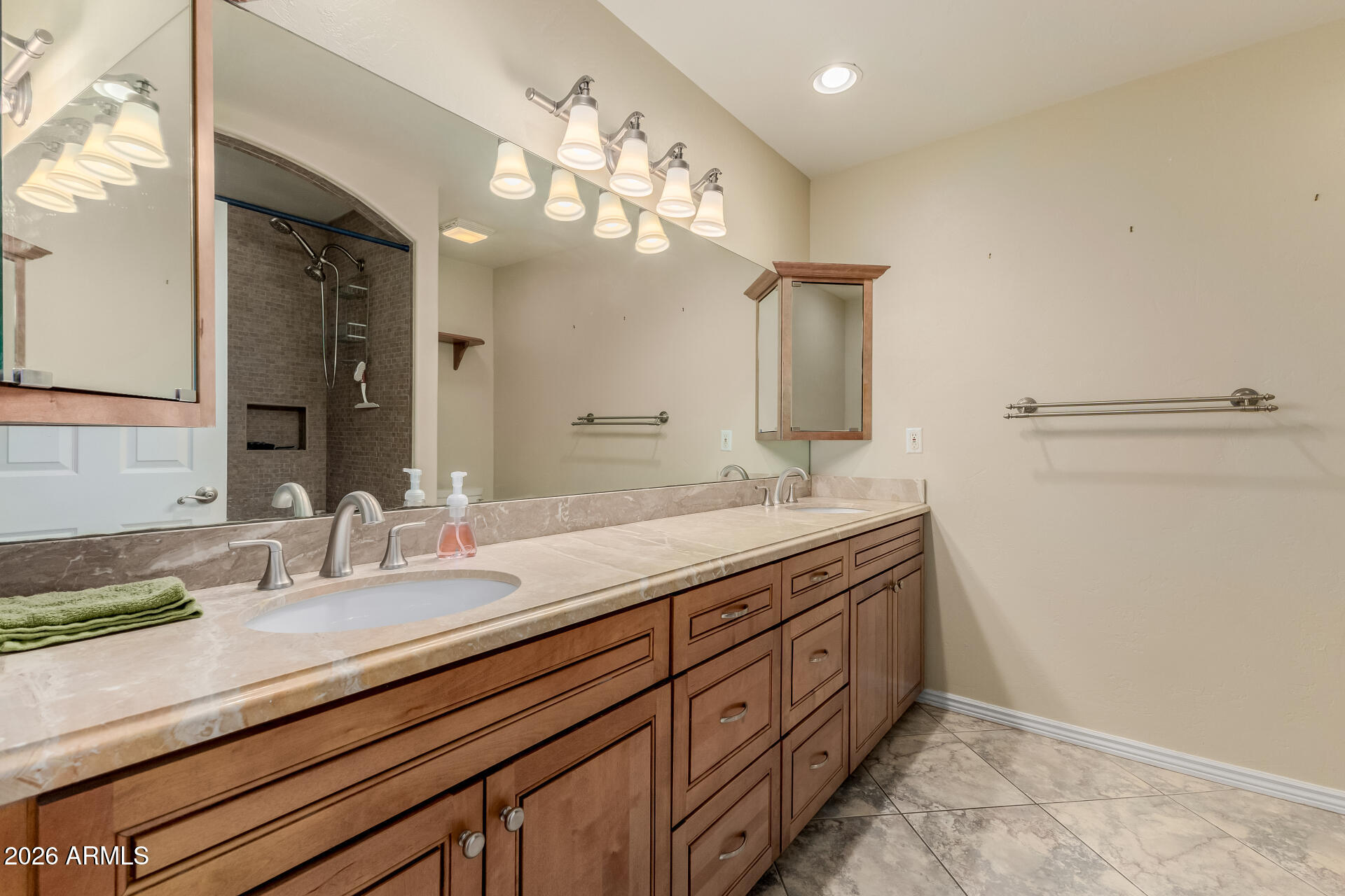 802 West Caribbean Lane Phoenix, AZ 85023 - Photo 35 of 47 a bathroom with a granite countertop sink a large mirror and a