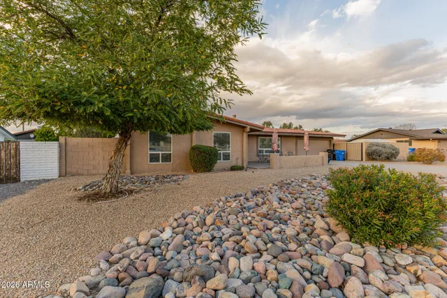 front view of a house with a small yard