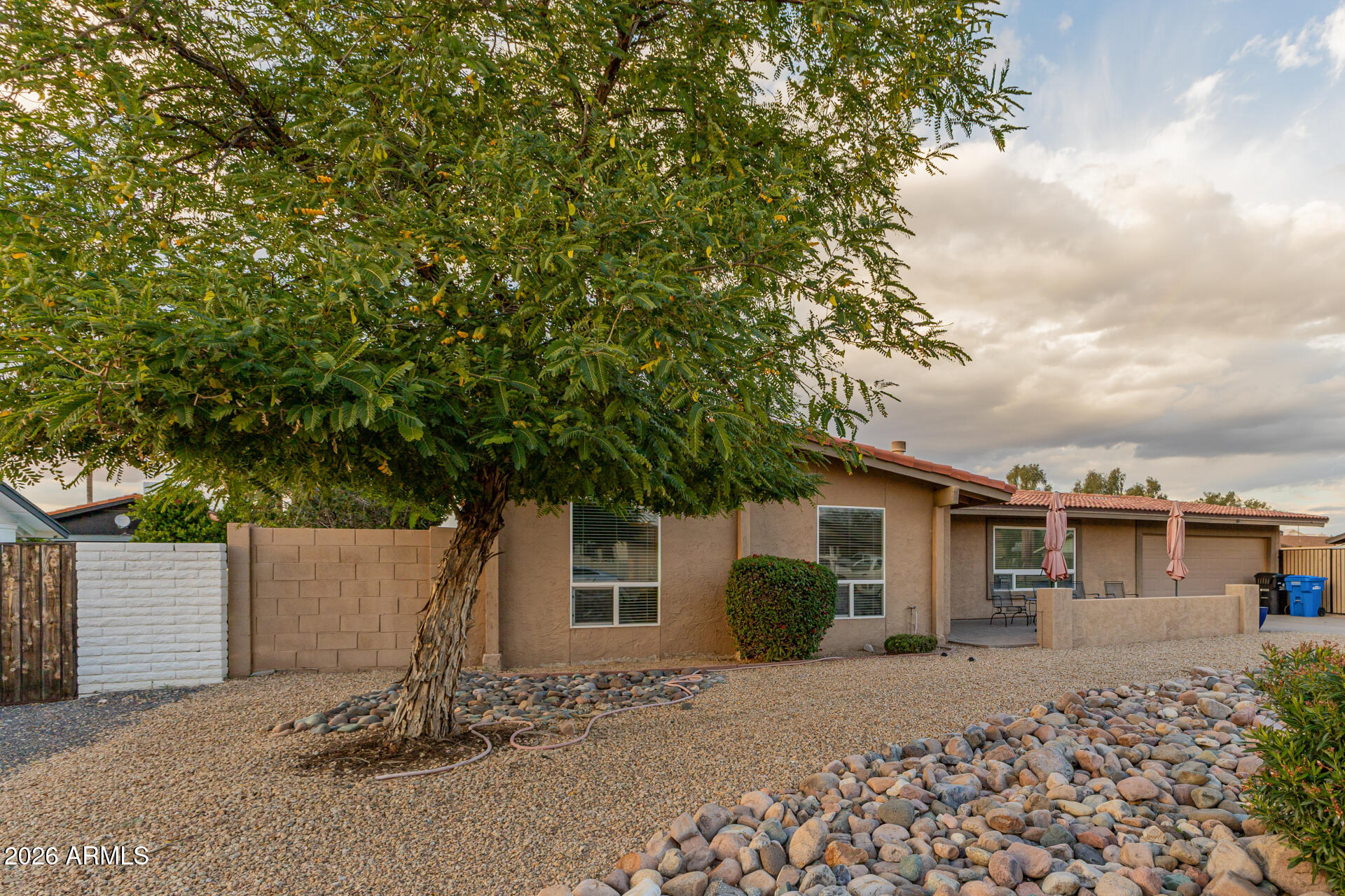 802 West Caribbean Lane Phoenix, AZ 85023 - Photo 10 of 47 front view of a house with a small yard